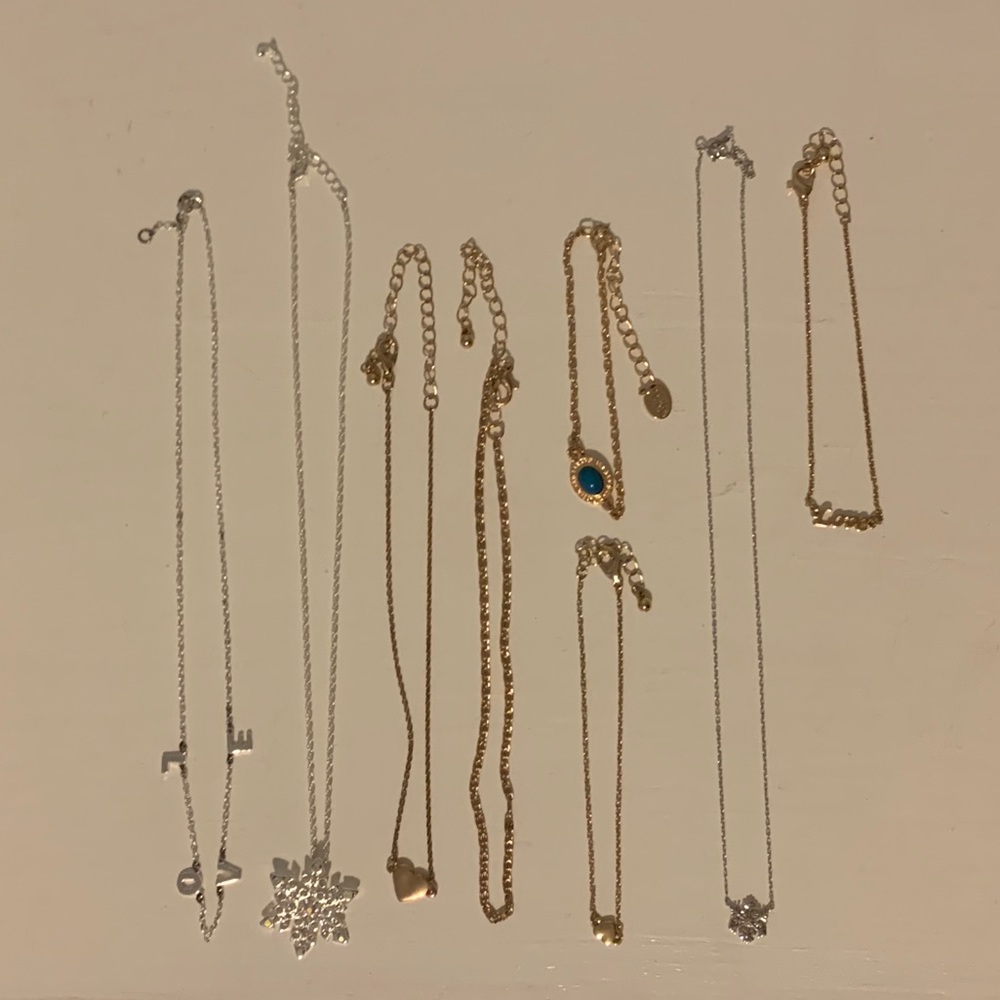 3 necklaces, 2 chokers, and 3 bracelets
